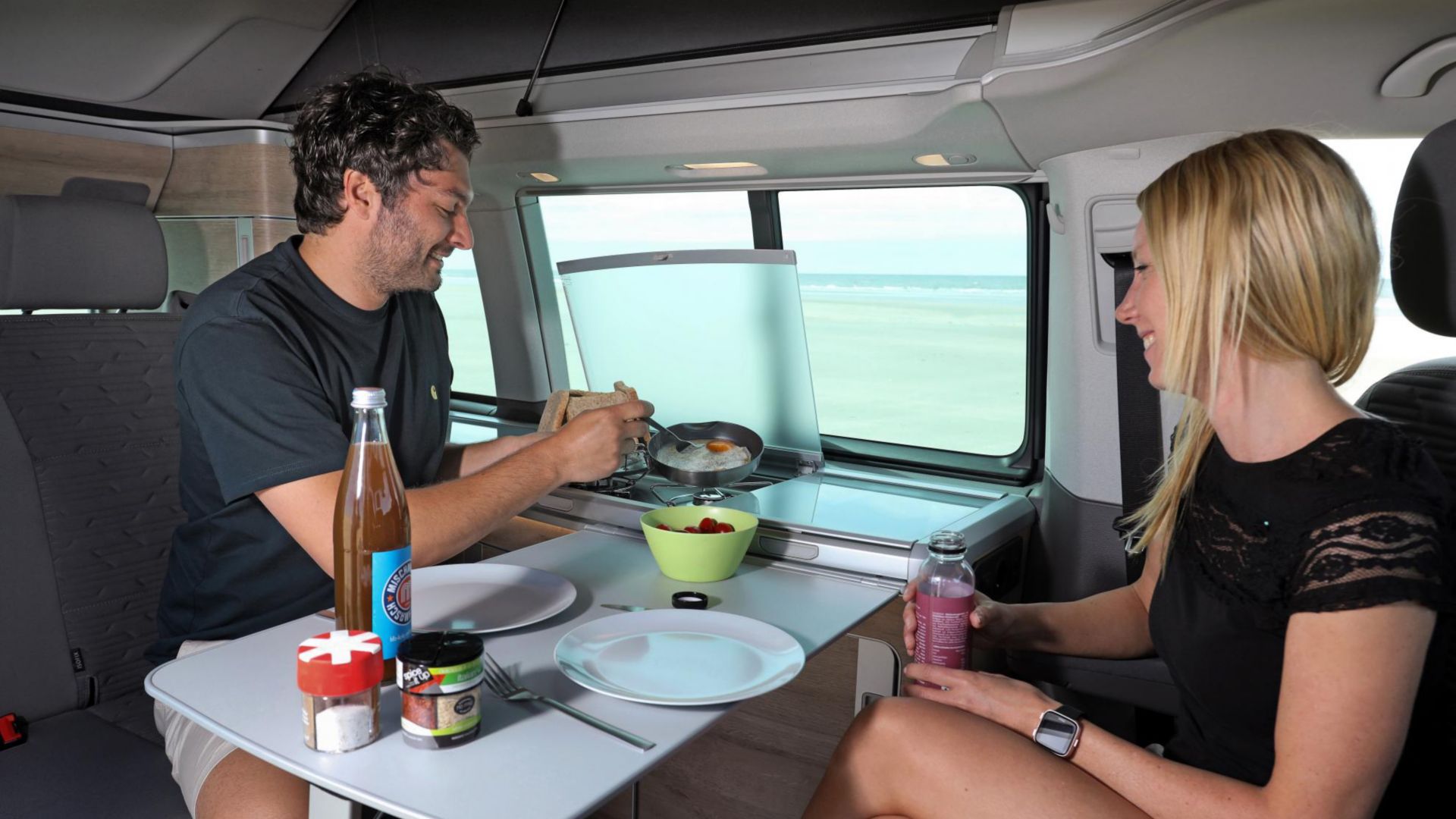 VW California Ocean inside table with couple