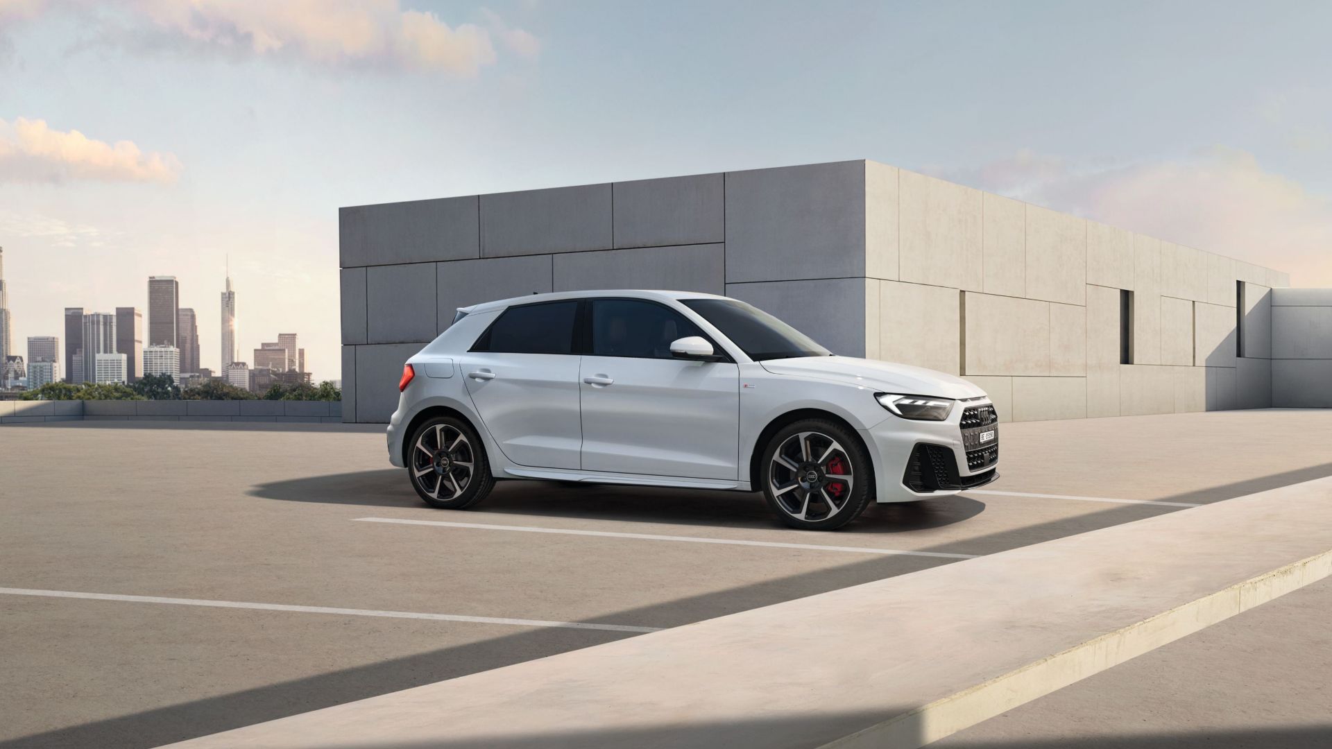 Audi A1 allstreet black rear view on road