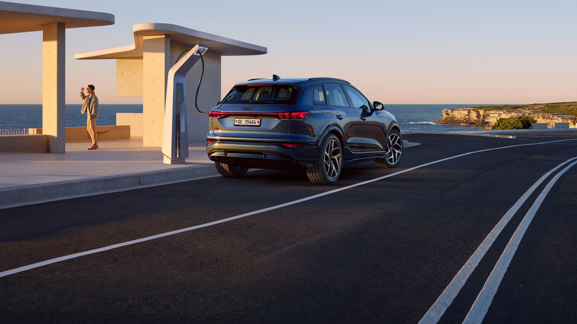 Audi Q6 e-tron rear view on a coastal road