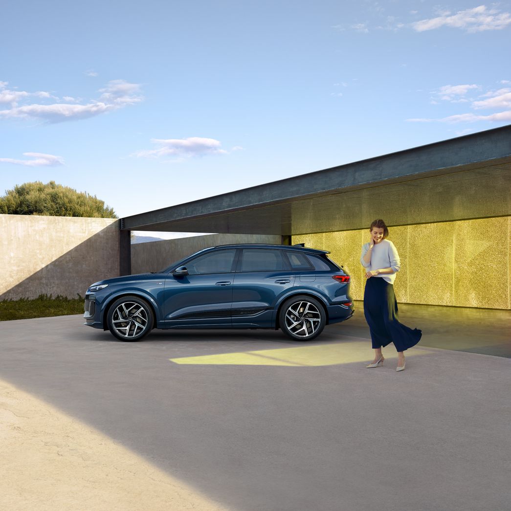 Blue Audi Q6 e-tron side view