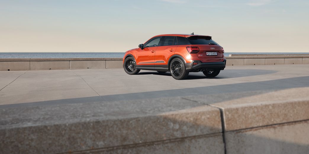 Audi SQ2 red, rear and side view