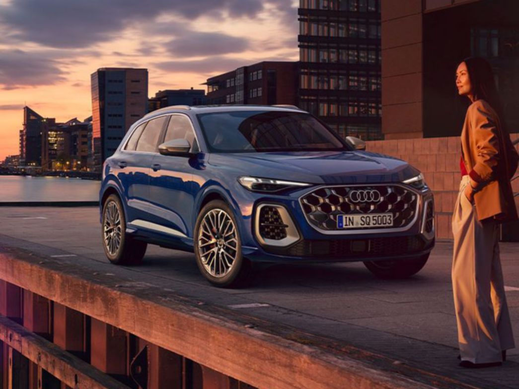 Blue Audi Q5 Sportback side and front