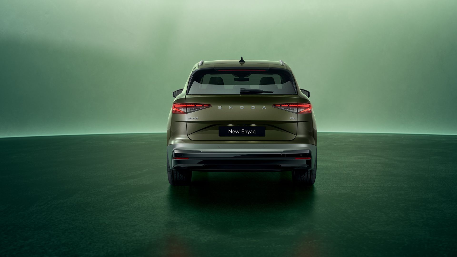 Green Skoda Enyaq rear view