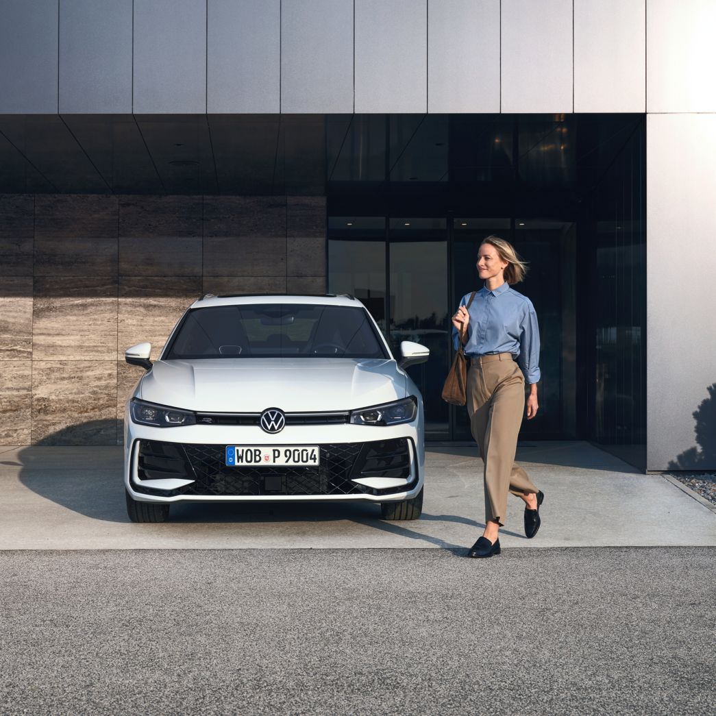 The VW Passat in front of the garage